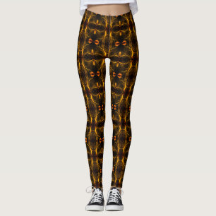 Shapes, gold dashes float in the dark background. leggings