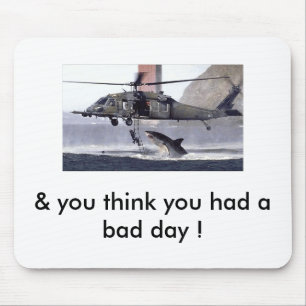 Shark attacks helicopter. mouse pad