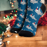 Shark Santa Hat Christmas Socks<br><div class="desc">Enjoy these fun shark Christmas socks during the holiday and all year round. They feature cartoon sharks in Santa hats as a pattern on a blue background. Simply add them to your cart, get them home, then add the joy of sharks to your already fun Christmas! Shark Santa Hat Christmas...</div>
