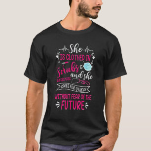 She Is Clothed In Scrubs & Facemask Proud Nurse Nu T-Shirt