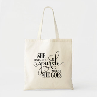 She leaves a little sparkle tote bag