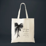 She’s Tying The Knot Black Bow Bridal Shower Tote Bag<br><div class="desc">Celebrate the bride-to-be with this She’s Tying The Knot Black Bow Bridal Shower Tote Bag, designed with a chic coquette-inspired black bow and elegant modern typography. Perfect for bridal showers, bachelorette celebrations, and wedding events, this stylish tote makes a thoughtful gift for the bride, bridesmaids, or guests. Ideal as a...</div>