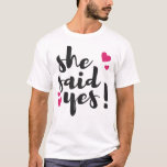 She Said Yes! Engagement Celebration – Romantic  T-Shirt<br><div class="desc">Celebrate one of life’s most unforgettable moments with this beautiful “She Said Yes!” text-based design. Perfect for engagement announcements, bridal celebrations, and wedding planning excitement, this romantic statement captures the joy of saying yes to forever. Ideal for T-shirts, mugs, invitations, stickers, and engagement party décor, this design makes a thoughtful...</div>