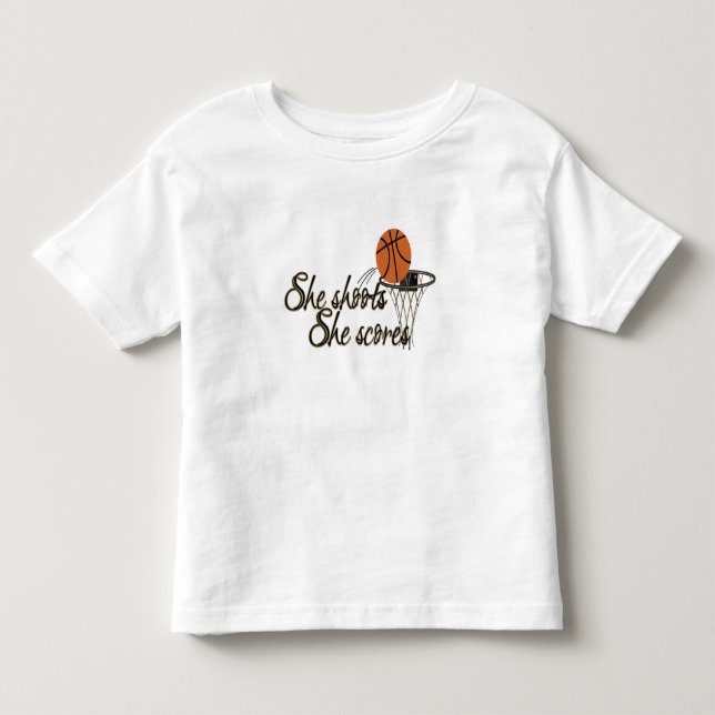 She Shoots...She Scores Toddler T-Shirt (Front)