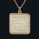 Sheet Music on Parchment Handwritten in Ink Gold Plated Necklace<br><div class="desc">Old vintage sheet music handwritten in black ink on an antique beige parchment with notes. Memories from a time long ago,  when music was handwritten in ink. Notations and scribblings on the side give it a personal touch.</div>