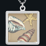 Shell Trio on Khaki Silver Plated Necklace<br><div class="desc">Megan Meagher is known for her simple art pieces. This is a great image of decorative art capturing the sea life with a yellow starfish and a blue and red conch shell. Get this fine art print today on Khaki colour on your Zazzle product.</div>