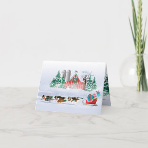 Sheltie Dogs Pulling Red Sleigh Holiday Card