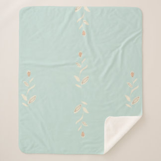 Sherpa manta with floral design. blanket