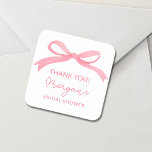 She's Tying The Knot Pink Bow Bridal Shower Square Sticker<br><div class="desc">Celebrate the bride-to-be with our "She's Tying The Knot" Pink Bow Bridal Shower Classic Sticker. Featuring a soft blush pink background and an elegant bow design, these stickers add a charming touch to any bridal shower. Perfect for sealing invitations, embellishing favour bags, or decorating party accessories, they offer a stylish...</div>