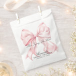 She's Tying The Knot Pink Bow Favour Bag<br><div class="desc">Celebrate the bride-to-be in timeless style with our She’s Tying the Knot bridal shower invitation! This elegant design features a soft blush pink bow paired with modern typography for a feminine and classy touch. Perfect for a chic and romantic bridal shower, brunch, or afternoon tea. Text and background colors are...</div>