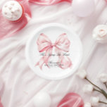 She's Tying The Knot Pink Bow Paper Plates<br><div class="desc">She's Tying The Knot Pink Bow Paper Plates Celebrate the bride-to-be in timeless style with our She’s Tying the Knot bridal shower invitation! This elegant design features a soft blush pink bow paired with modern typography for a feminine and classy touch. Perfect for a chic and romantic bridal shower, brunch,...</div>