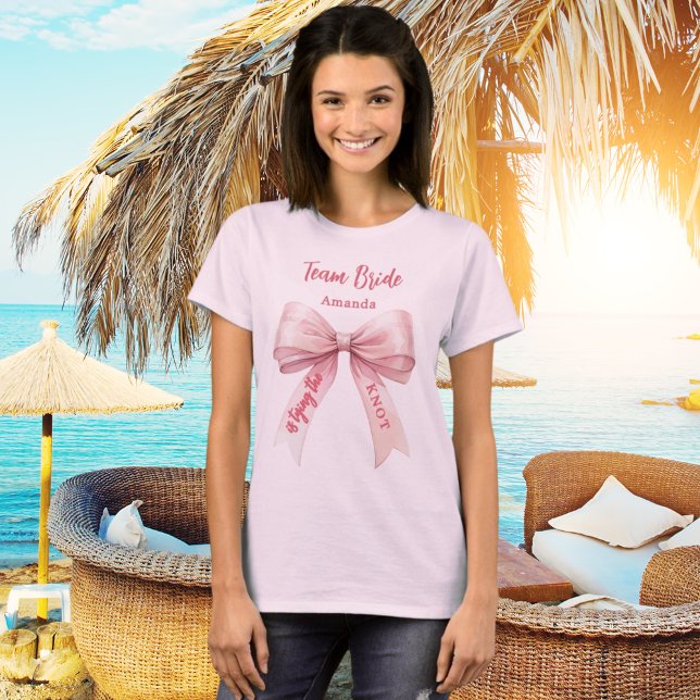 She's tying the knot pink bow Team Bride T-Shirt (Creator Uploaded)