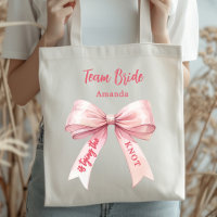 She's tying the knot pink bow Team Bride