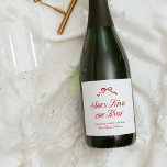 She's Tying The Knot Red Elegant Hand Drawn Bow Sparkling Wine Label<br><div class="desc">The "She's Tying the Knot Red Elegant Hand Drawn Bow" collection is a timeless celebration of love and elegance. Centred around a delicate, hand-drawn bow, this suite combines refined typography with a bold red palette, creating a striking and sophisticated aesthetic. Perfect for a bridal shower steeped in charm and grace,...</div>
