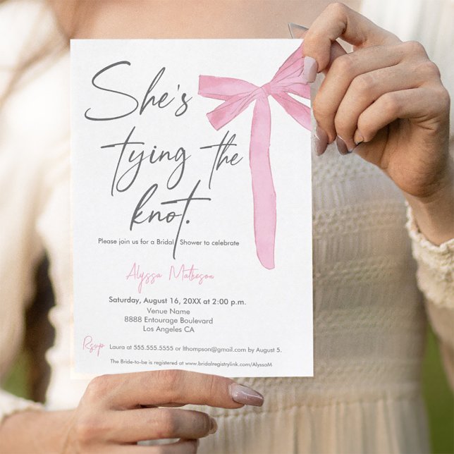 She's Tying the knot Script Pink Bow Bridal Shower Invitation (She's tying the knot script bridal shower invitation template with pink bow.)