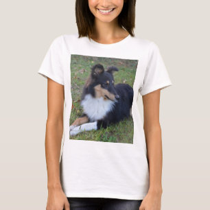 shet shp black white tan laying full T-Shirt