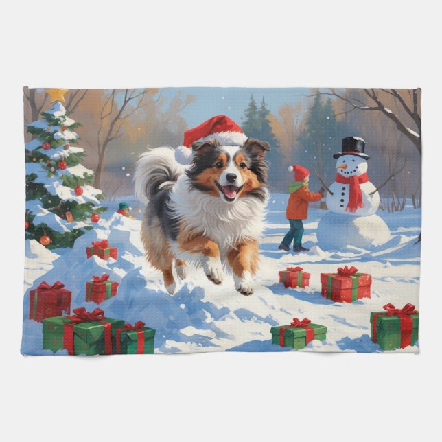 Shetland Sheepdog Running Snow With Christmas Hat Tea Towel (Horizontal)