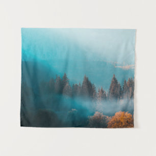Shining light on foggy autumn forest tapestry