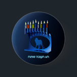 Shiny Blue Chanukkah Menorah 6 Cm Round Badge<br><div class="desc">A modernistic,  metallic,  blue Chanukkah menorah,  featuring a lion in silhouette,  against a dark,  night-like background. All nine of the candles are lit. Hebrew text reading "Chag Chanukkah Sameach" (Happy Hanukkah) also appears in glowing blue and white.</div>