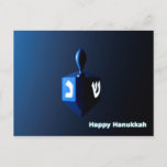 Shiny Blue Dreidel Postcard<br><div class="desc">A modernistic,  metallic blue dreidel against a dark,  night-like background.  Two of the Hebrew letters found on a dreidel,  nun and shin,  glow brightly.  Text reading "Happy Hanukkah" also appears in glowing blue and white.</div>