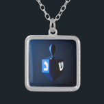 Shiny Blue Dreidel Silver Plated Necklace<br><div class="desc">A modernistic,  metallic blue dreidel against a dark,  night-like background.  Two of the Hebrew letters found on a dreidel,  nun and shin,  glow brightly.</div>