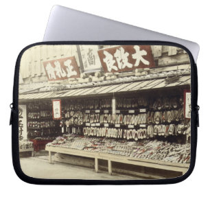 Shoe shop in Kyoto, c.1890 (hand-coloured photo) Laptop Sleeve