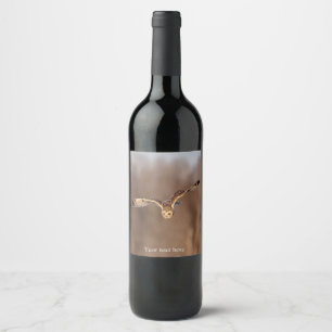 Short-eared owl diving towards the ground wine label