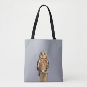 Short-eared owl on a post tote bag