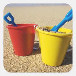 Shovels And Pails On Sandy Beach Square Sticker