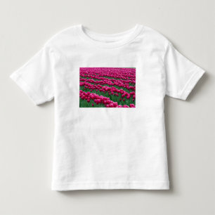 Show garden of spring-flowering tulip bulbs in toddler T-Shirt