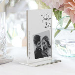 Show-Stopping Photo Wedding Table Number Cards<br><div class="desc">Make your wedding reception unforgettable with these stunning personalised photo wedding number card! Wow your guests with a unique way to display your love story. Simply upload your favourite photo and add your names and wedding date for a touching and elegant centerpiece that doubles as a functional table number. Crafted...</div>