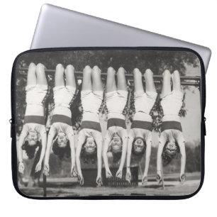 Showgirls on monkey bars, playful design. laptop sleeve