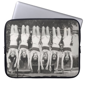 Showgirls on monkey bars, playful design. laptop sleeve