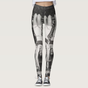 Showgirls on monkey bars, playful design. leggings