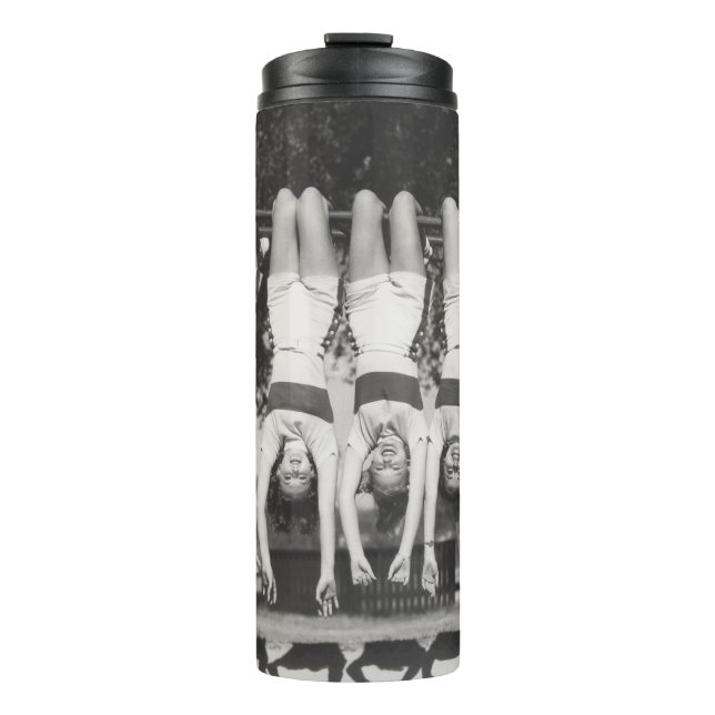 Showgirls on monkey bars, playful design. thermal tumbler (Front)