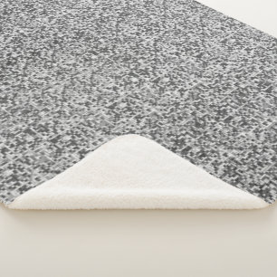 Shuffled small squares, tones of grey go to clear sherpa blanket