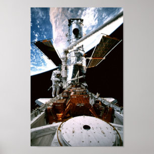 Shuttle Discovery Docked with Hubble Telescope Poster