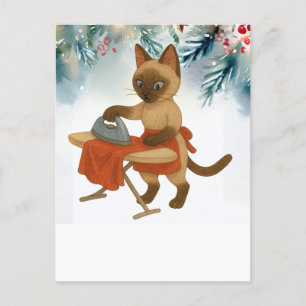 Siamese Cat is ironing dress for Christmas Holiday Postcard