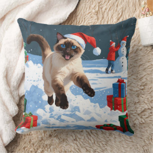 Siamese Cat Running in Snow with Christmas Hat Cushion