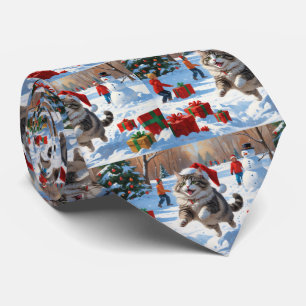 Siberian Cat Running in Snow with Christmas Hat Tie