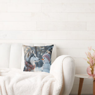 Siberian Husky Looking At a Snowman Cushion