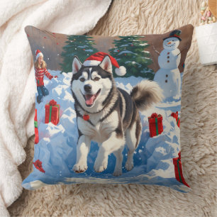 Siberian Husky Running in Snow with Christmas Hat Cushion