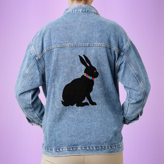 Side Profile Black Silhouette Rabbit Flowers Denim Jacket (Sitting black silhouette bunny rabbit with ring of colourful flower petals on a womans denim jacket.)