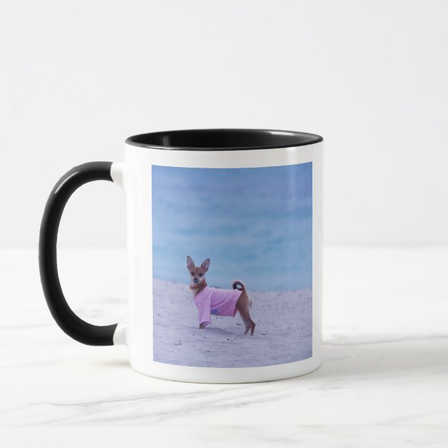 Side profile of a dog standing on the beach, mug (Left)