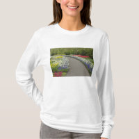 Sidewalk pathway through tulips and daffodils, 2