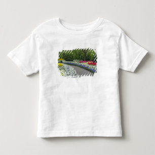 Sidewalk pathway through tulips and daffodils, toddler T-Shirt
