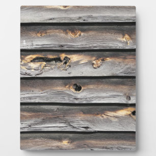 signed by the weather as old wood background plaque