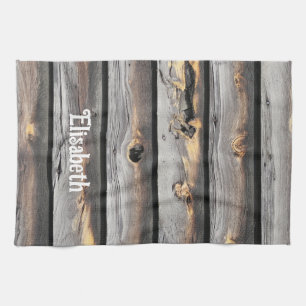 signed by the weather as old wood background tea towel