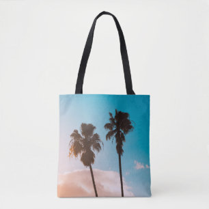 Silhoette of palm tree tote bag