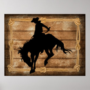 Silhouette cowboy on a bucking bronco horse poster